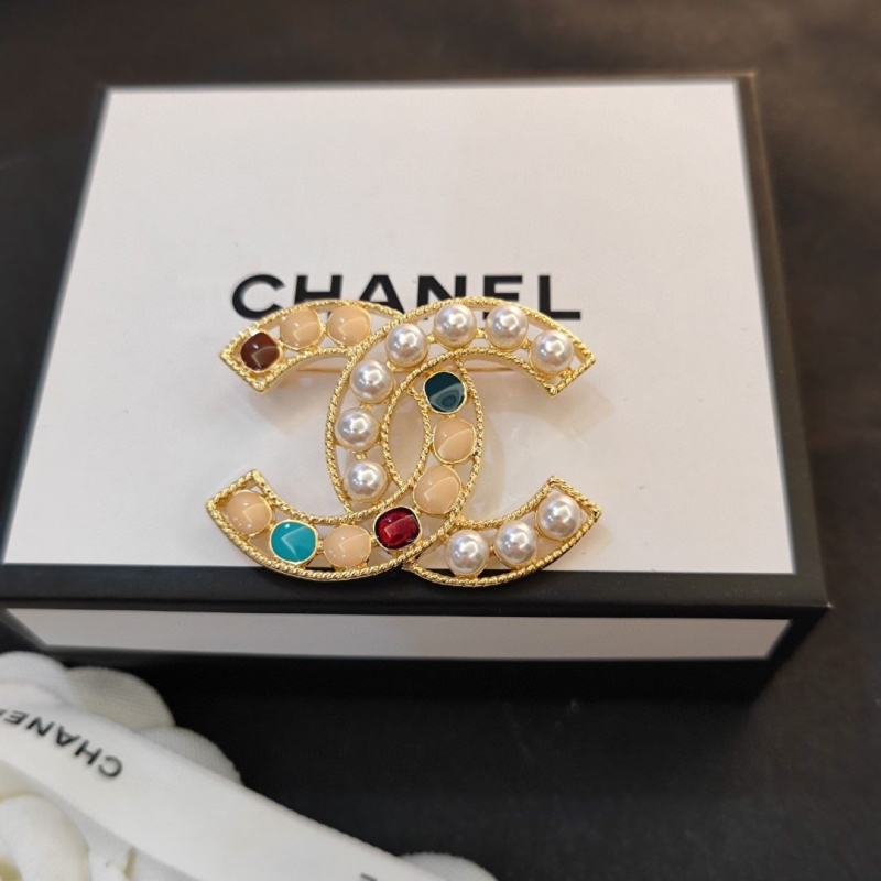 Ch**el brooches